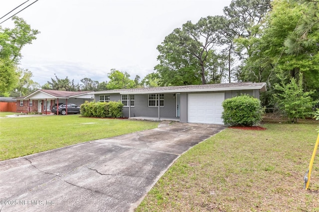 ranch-style home with a garage and a front yard