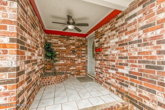 view of patio / terrace featuring ceiling fan