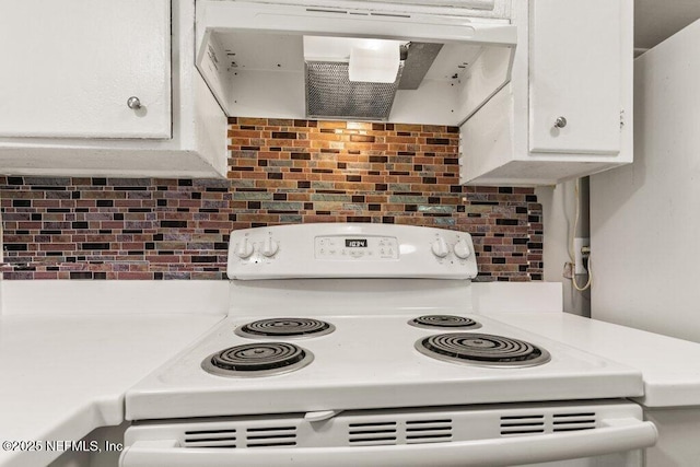 kitchen with white cabinetry, decorative backsplash, and white range with electric stovetop