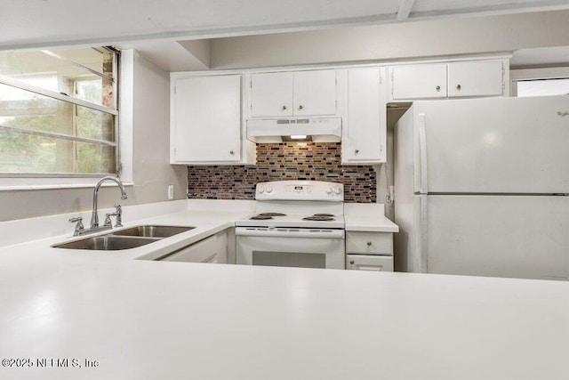 kitchen with sink, white appliances, decorative backsplash, and white cabinets