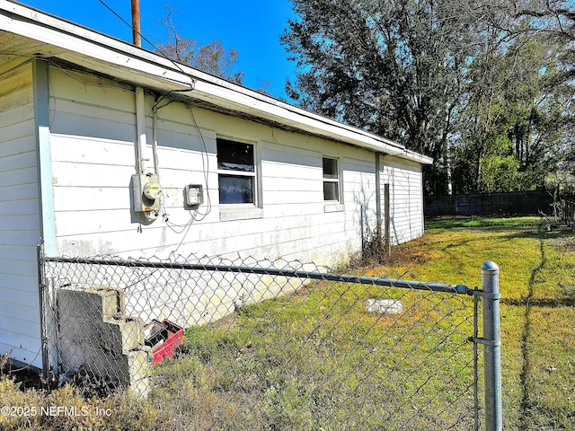 view of home's exterior featuring a lawn