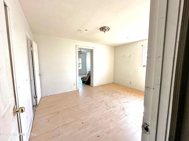 spare room with light hardwood / wood-style floors