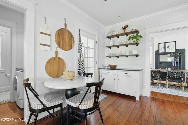 dining area featuring crown molding and dark hardwood / wood-style floors