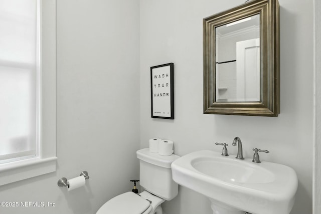 bathroom with sink and toilet