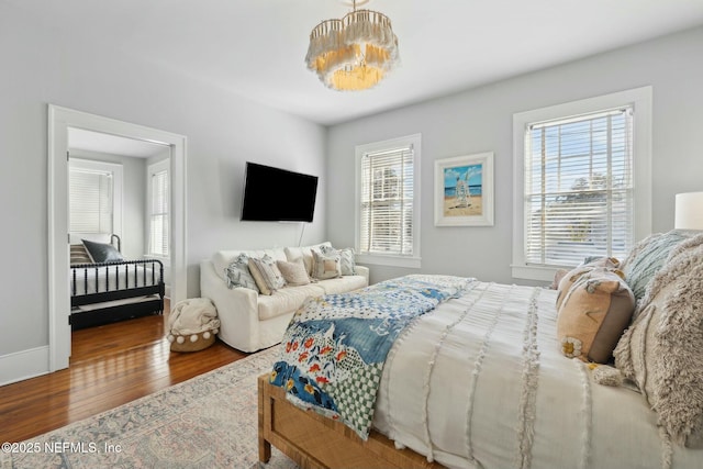 bedroom featuring wood-type flooring