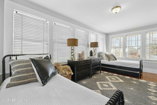 bedroom featuring dark wood-type flooring