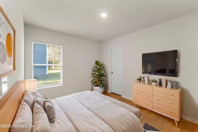 bedroom featuring light hardwood / wood-style flooring