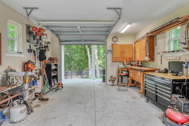 garage with a workshop area