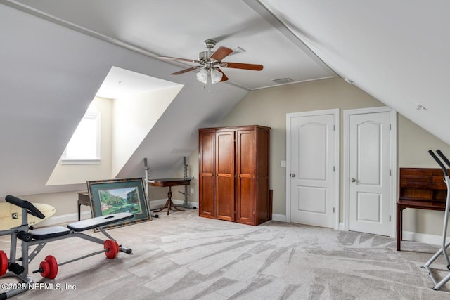 workout room with light carpet, vaulted ceiling, and ceiling fan