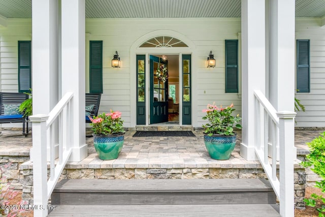 entrance to property with covered porch