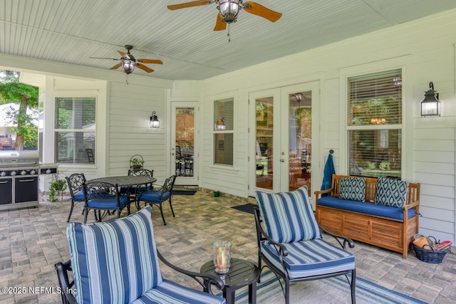 view of patio featuring an outdoor hangout area, french doors, and ceiling fan