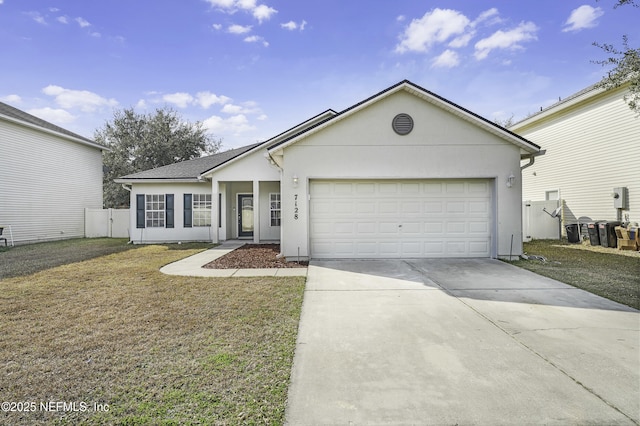 ranch-style home featuring a garage and a front lawn