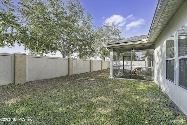 view of yard with a sunroom