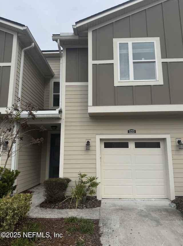 view of front of property with a garage