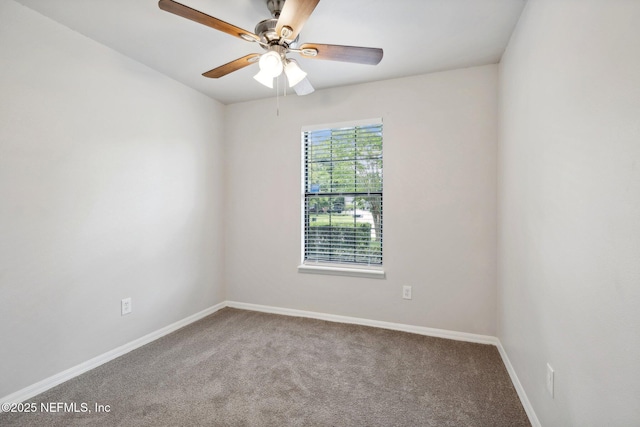 empty room featuring carpet floors and ceiling fan