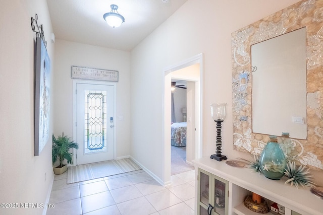 entrance foyer featuring light tile patterned floors