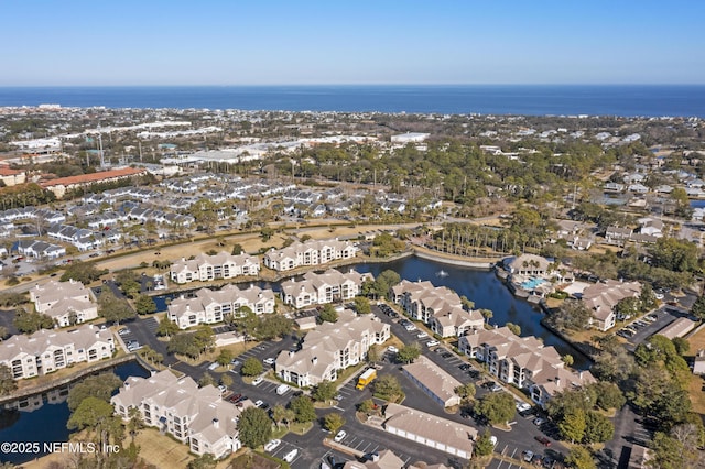 bird's eye view with a water view