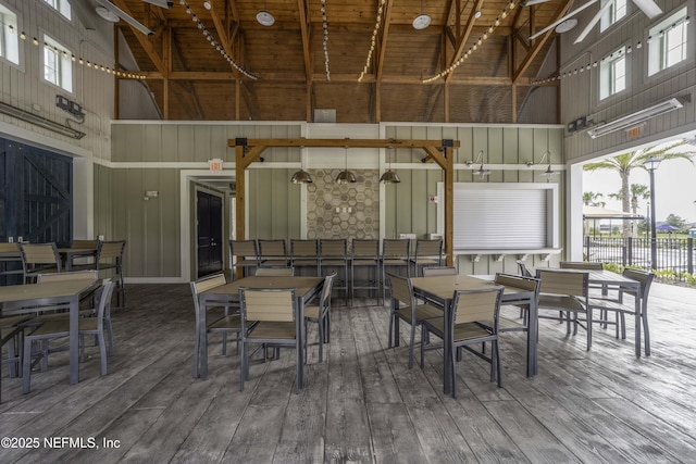 exterior space with wood finished floors and a wealth of natural light