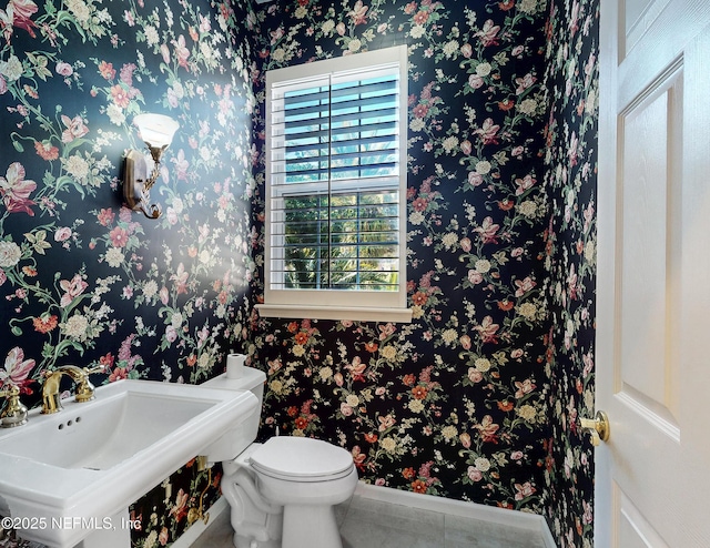 bathroom with sink and toilet