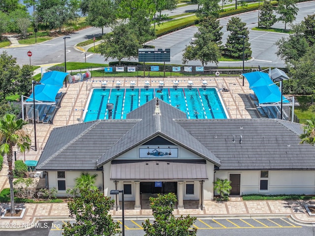 view of property with a community pool