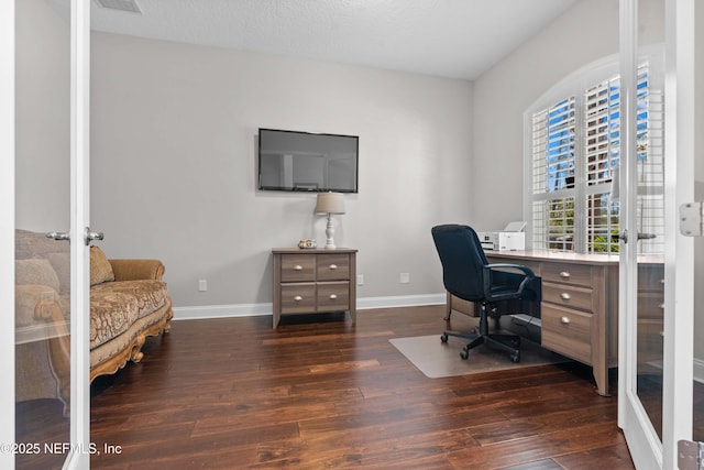 office featuring dark hardwood / wood-style floors and french doors