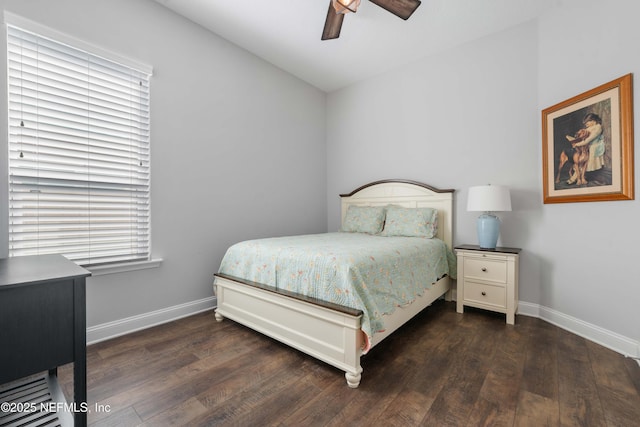 bedroom with dark wood-type flooring and ceiling fan