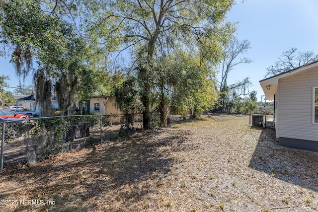 view of yard with central AC