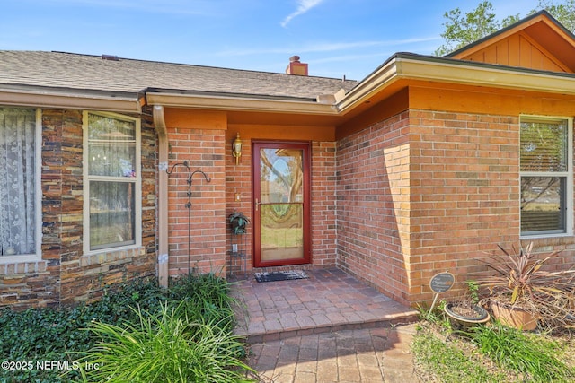 property entrance with a patio