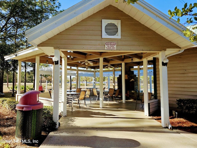 view of patio / terrace featuring a gazebo and ceiling fan