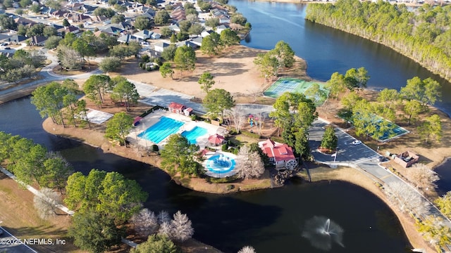 drone / aerial view with a water view