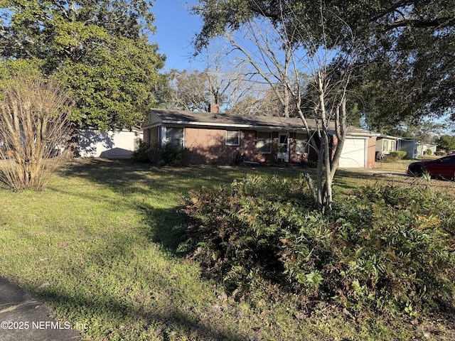 view of yard featuring a garage