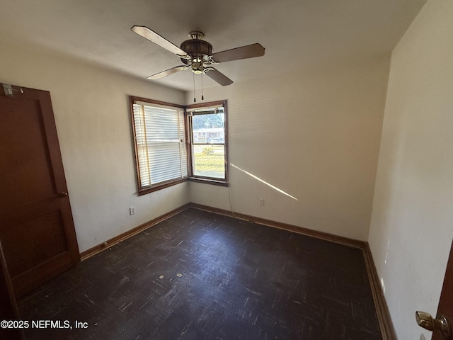 unfurnished room featuring ceiling fan