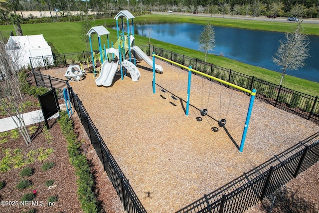 view of jungle gym featuring a water view