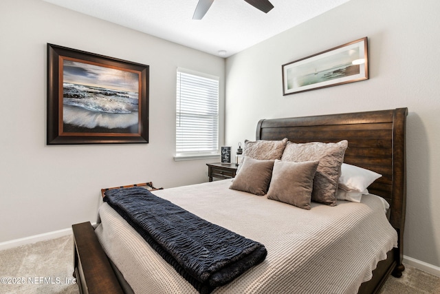 bedroom with light colored carpet and ceiling fan