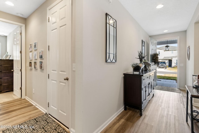 hall featuring wood-type flooring