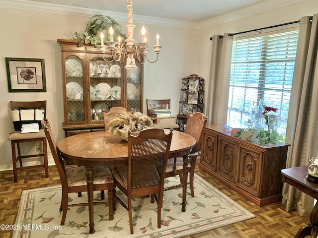 dining room with an inviting chandelier, crown molding, and dark parquet floors