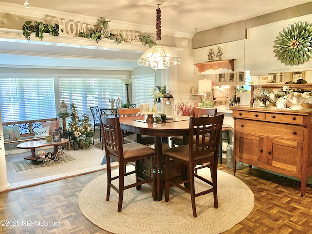 dining room with dark parquet floors