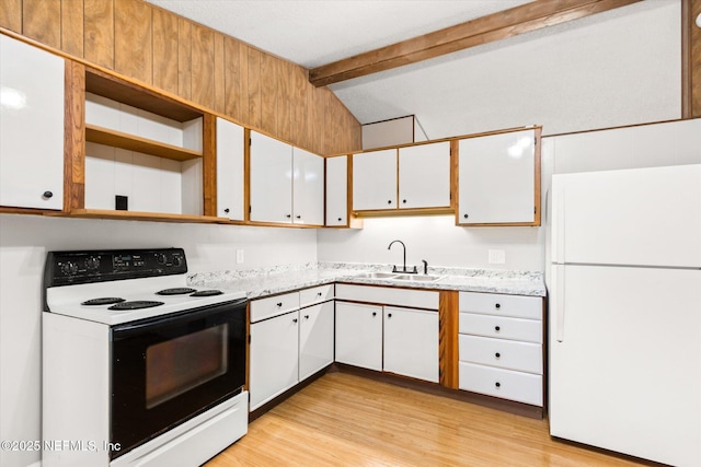 kitchen with range with electric stovetop, lofted ceiling with beams, white cabinetry, sink, and white refrigerator