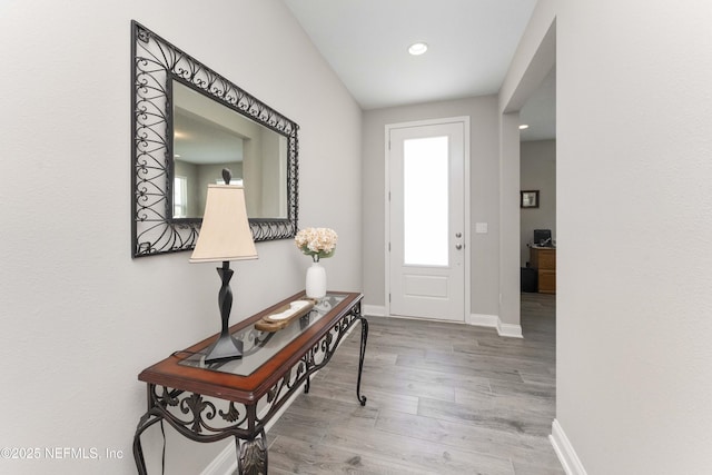 foyer with light hardwood / wood-style floors