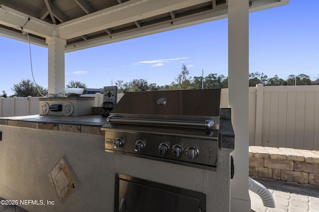 view of patio / terrace featuring area for grilling and grilling area