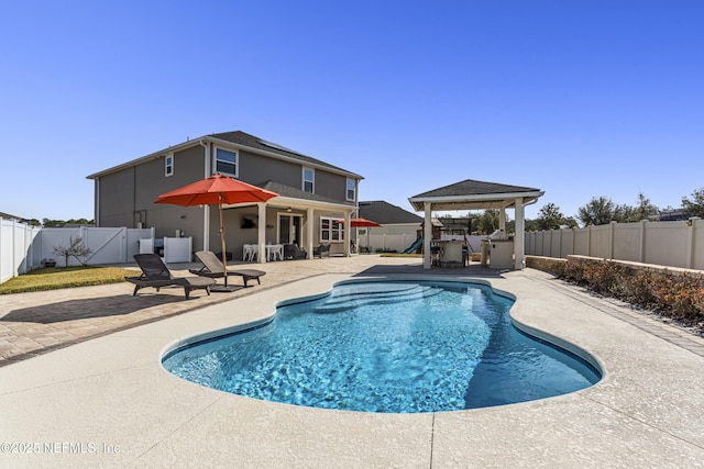 view of pool with a gazebo and a patio