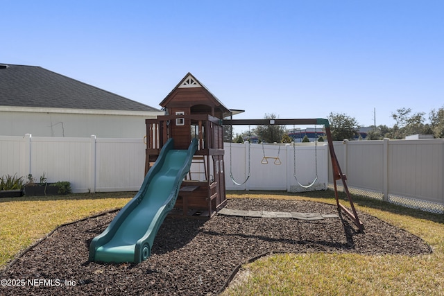 view of play area featuring a lawn