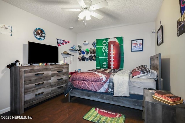5452 Huckleberry Ct, Macclenny, FL 32063 - bedroom with dark wood-style floors, a textured ceiling, and ceiling fan