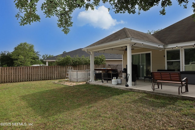 5452 Huckleberry Ct, Macclenny, FL 32063 - view of yard featuring a patio area and a ceiling fan
