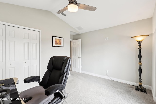 office space with vaulted ceiling, light carpet, and ceiling fan