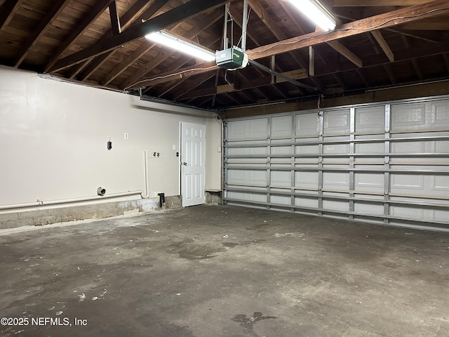 garage featuring a garage door opener