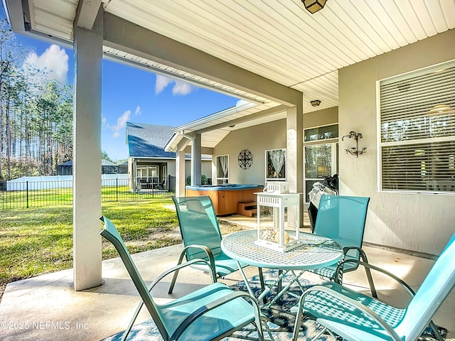 view of patio / terrace featuring a hot tub