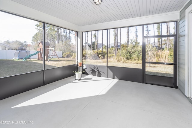 sunroom / solarium featuring a healthy amount of sunlight