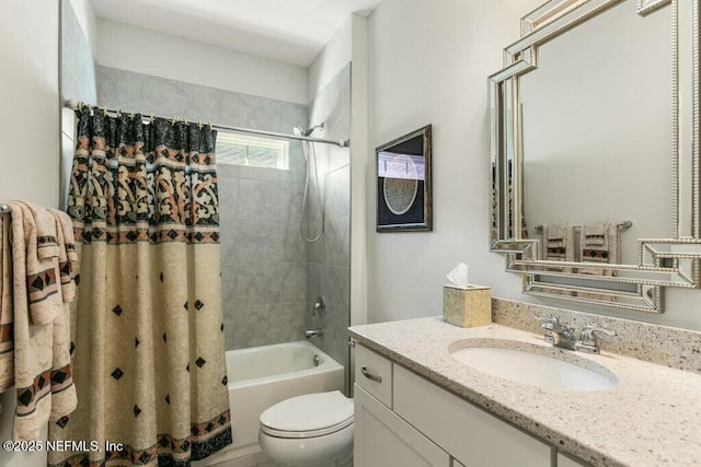 full bathroom featuring vanity, toilet, and shower / bath combo with shower curtain