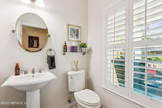 bathroom featuring toilet